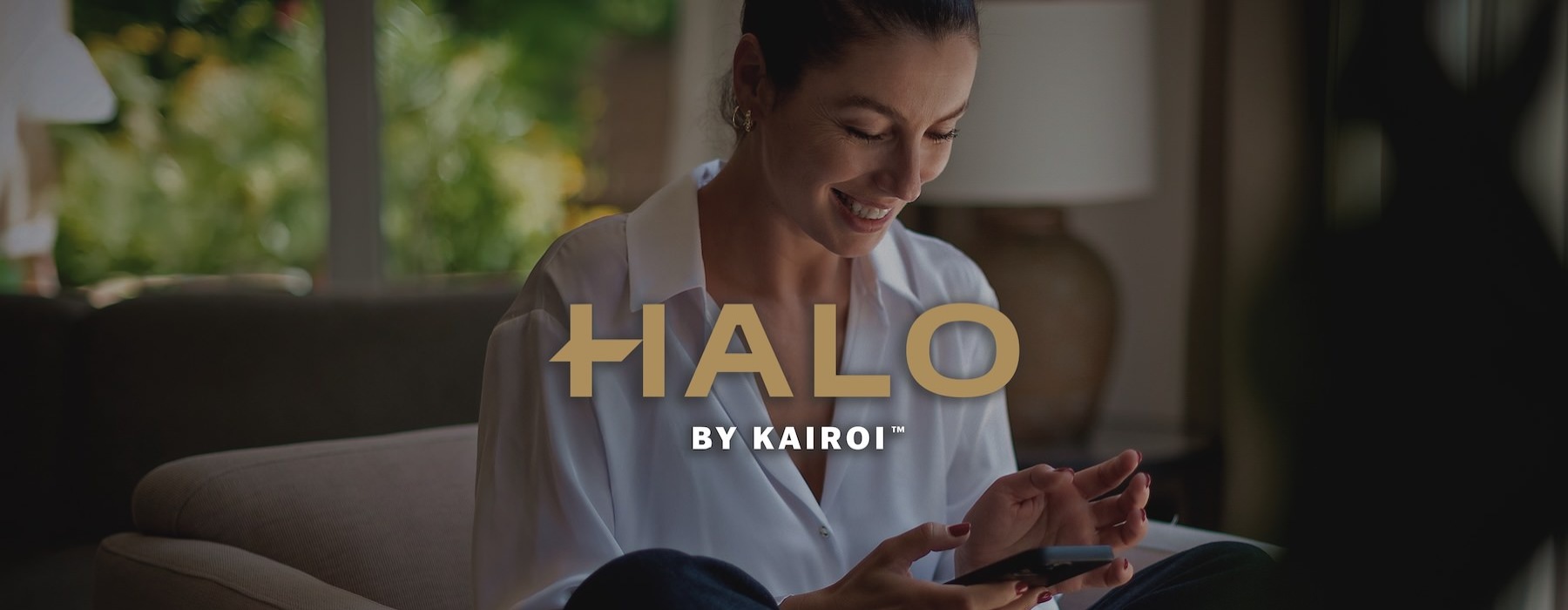 a woman holding a phone