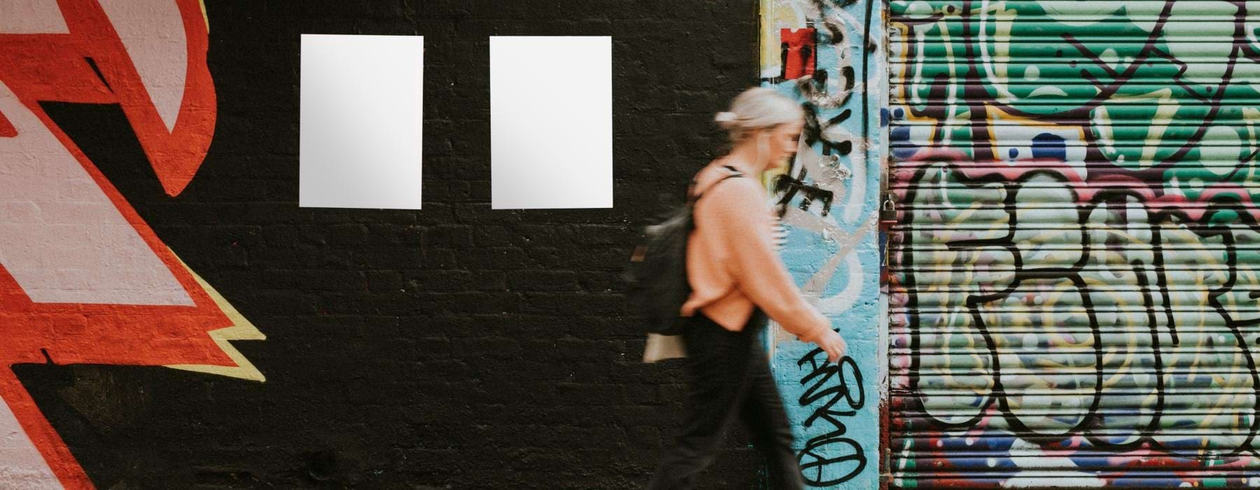 a person walking on a sidewalk